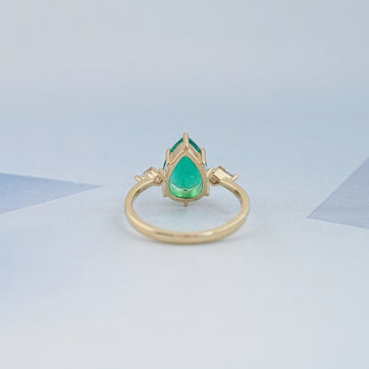 Green Pear And Kite Cut Three Stone Engagement Ring