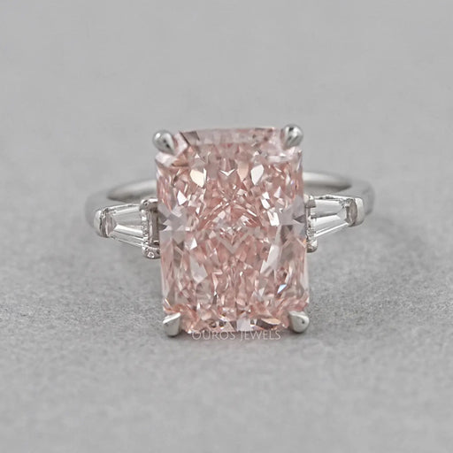front view of pink radiant-cut lab diamond three-stone colored engagement ring