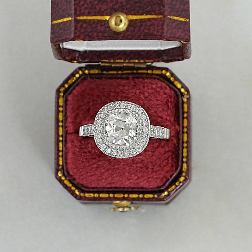 old mine cushion lab diamond halo engagement ring in red jewelry box