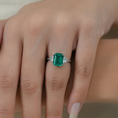 Emerald And Triangle Cut Trio Engagement Ring