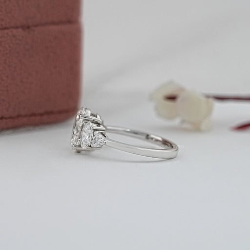 side view of oval and trillion cut lab diamond five stone engagement ring