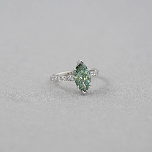 side view of green marquise-cut lab diamond solitaire accent wedding ring
