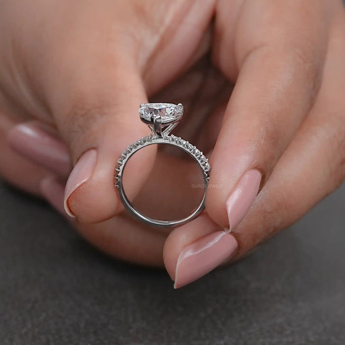 close view of certified heart-shaped lab diamond solitaire accent wedding ring