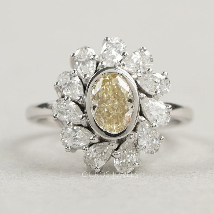 Yellow Oval Bezel Set Diamond With  Pear Halo Ring