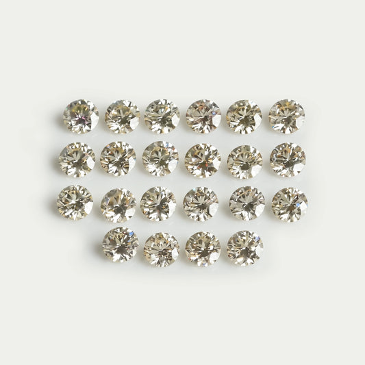 Fancy Light Yellow Round Loose Diamond
