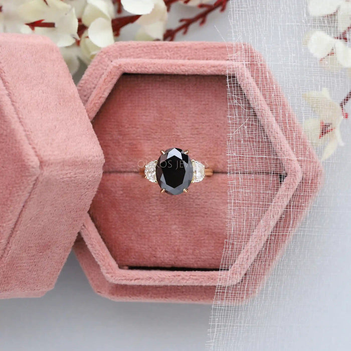 black oval diamond engagement ring 