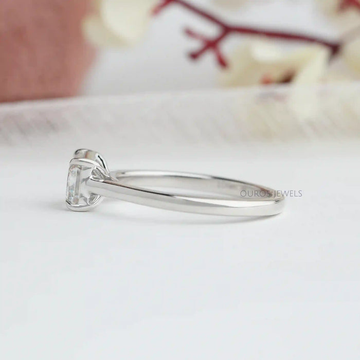 side view of east west criss cut diamond engagement ring
