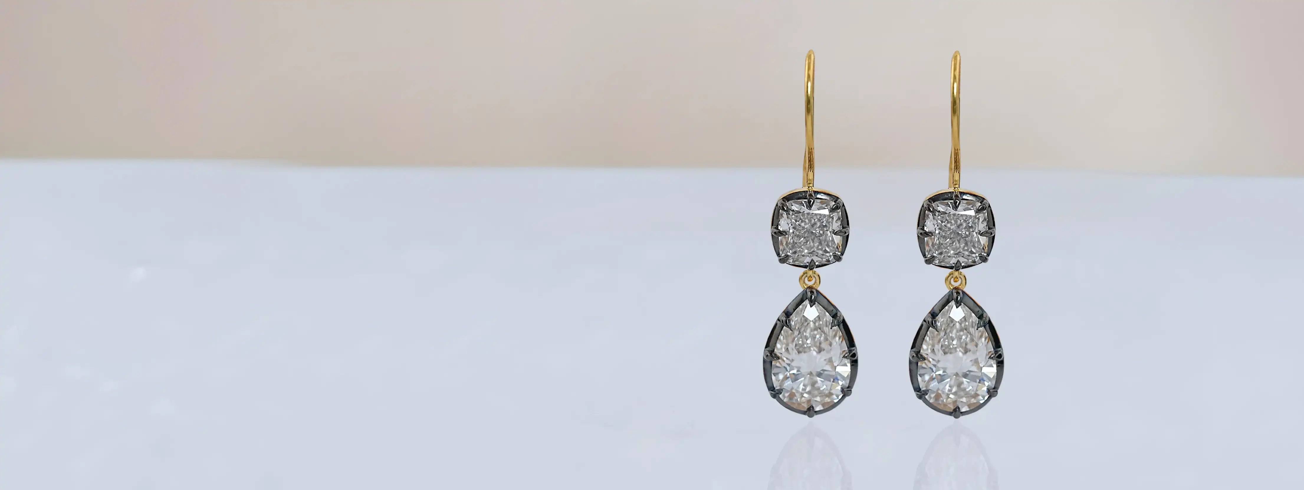 cushion and pear diamond dangle earrings