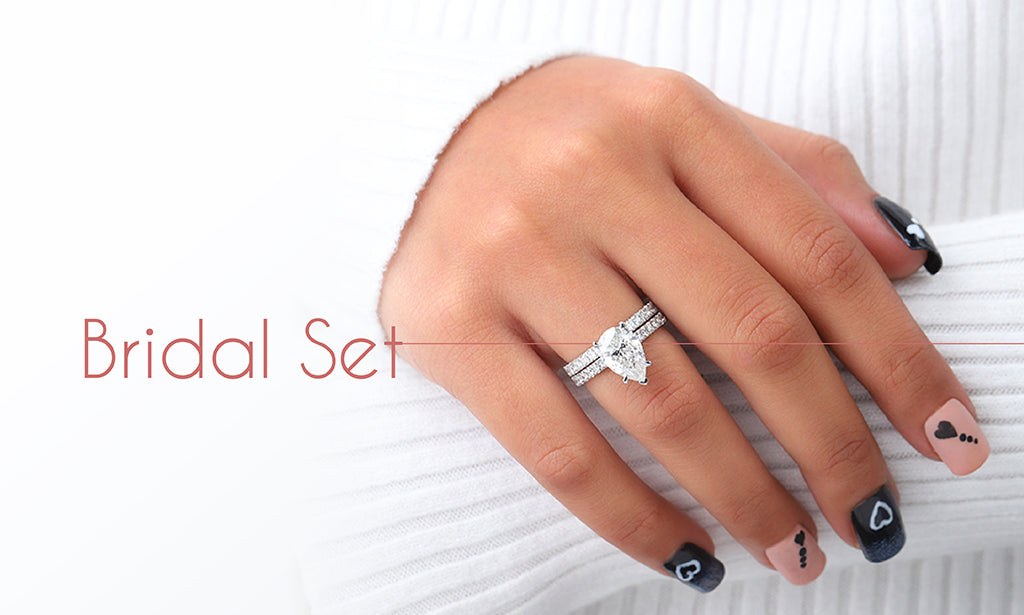 Image showcasing three-ring bridal set featuring a lab-grown diamond engagement ring with a matching wedding band, gorgeous designed for a perfect fit