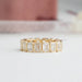 Bezel Set Emerald Cut Full Eternity Wedding Band in a yellow gold setting.