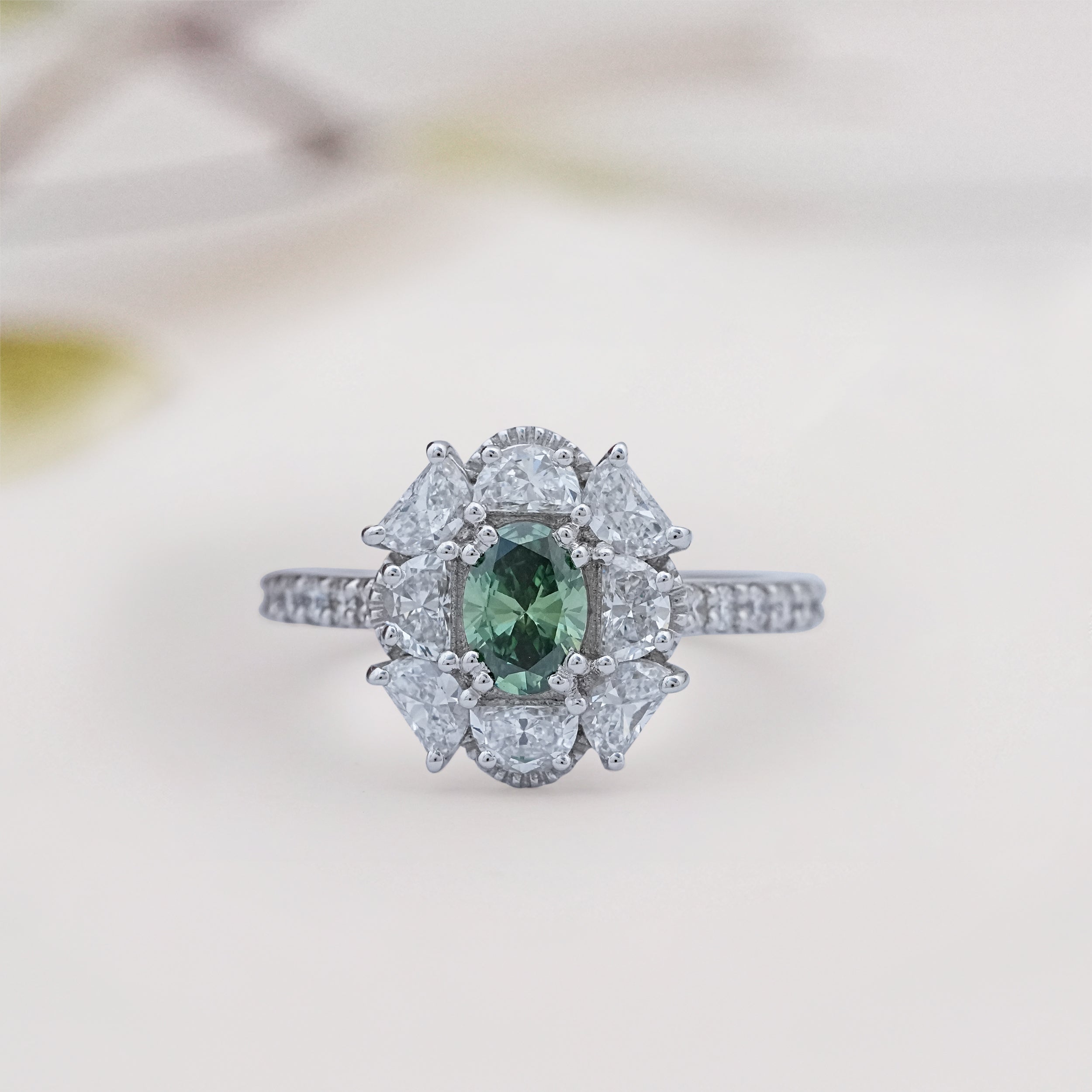 Green Oval Diamond Halo Ring