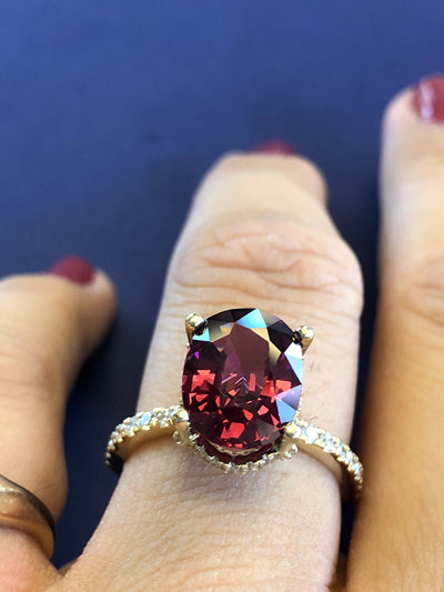 red gemstone vintage engagement ring 