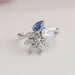 Blue pear and round vintage diamond engagement ring