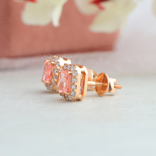 side view of pink radiant cut halo diamond stud earrings rose gold