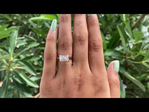 radiant cut diamond east west ring