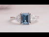 Youtube video of blue emerald cut three stone engagement ring