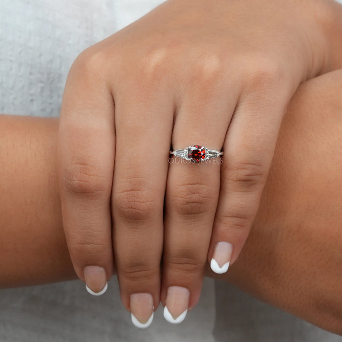 In finger look of red round lab created diamond three stone engagement ring 