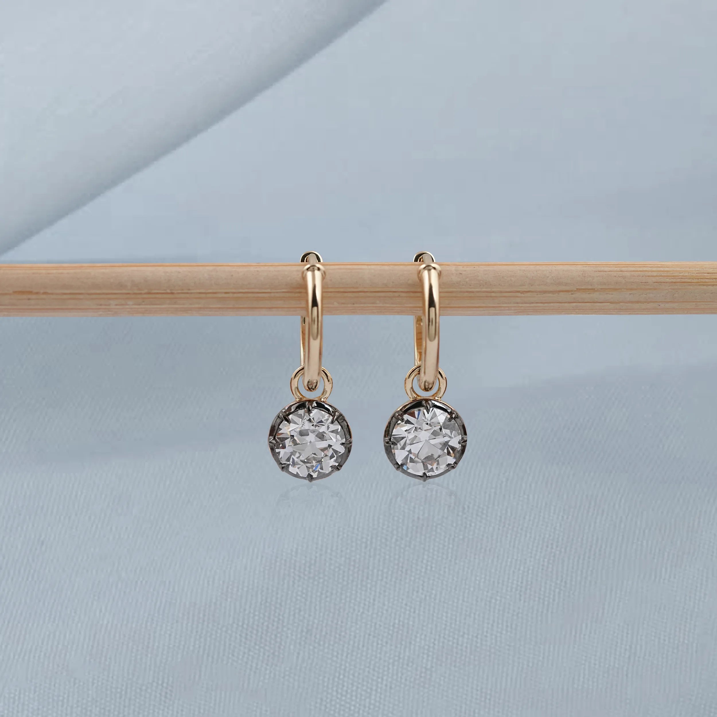 Round diamond dangle earrings