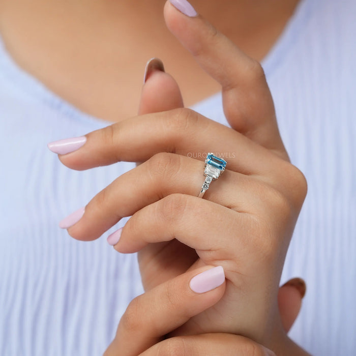 In Finger View Of lab Made Emerald blue Diamond Engagement Ring
