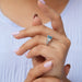 In Finger View Of lab Made Emerald blue Diamond Engagement Ring