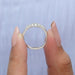 U prong diamond wedding band with emerald cut lab diamonds