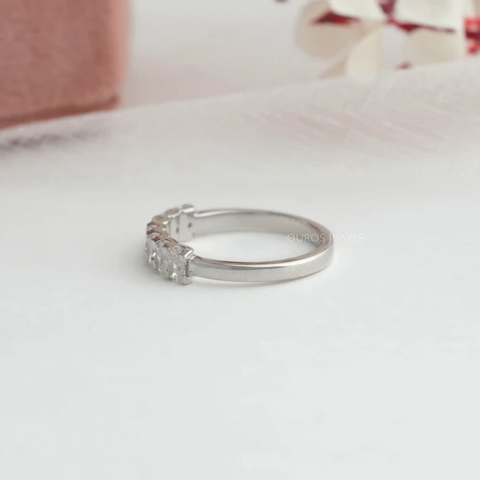 14k white gold shank of oval seven stone diamond wedding band