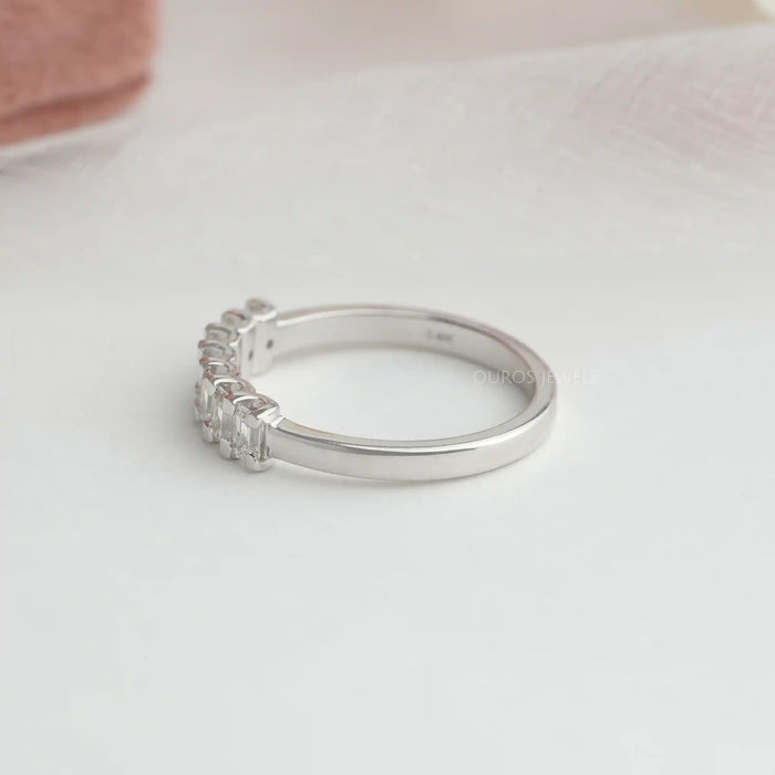 14k white gold band of emerald cut seven stone wedding band