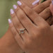 In finger look of step cut oval lab created diamond solitaire engagement ring