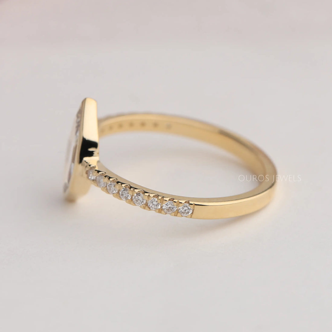 Moval Cut Solitaire Accent Diamond Ring