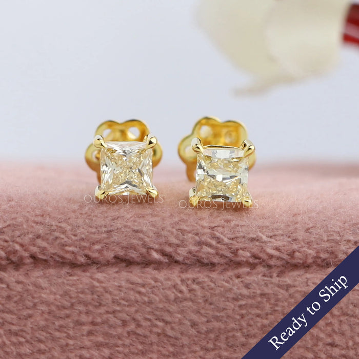 Yellow princess cut lab grown diamond stud earrings in 14k yellow gold