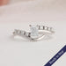 Radiant cut diamond bypass set wedding band in 14k white gold