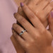 In finger front look of fancy lab made diamond engagement ring with inifinty design