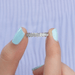 [A Women Holding Unique Milgrain Hexagone Shape Wedding Band]-[Ouros Jewels]