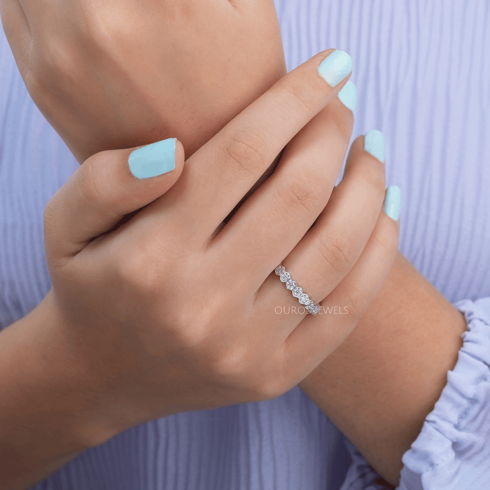 [A Women wearing Heagone Round Cut Diamond Eternity b=Band]-[Ouros Jewels]