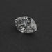 2.50 Carat Marquise Cut Loose Diamond resting on a dark surface, highlighting its intricate facets and clarity.