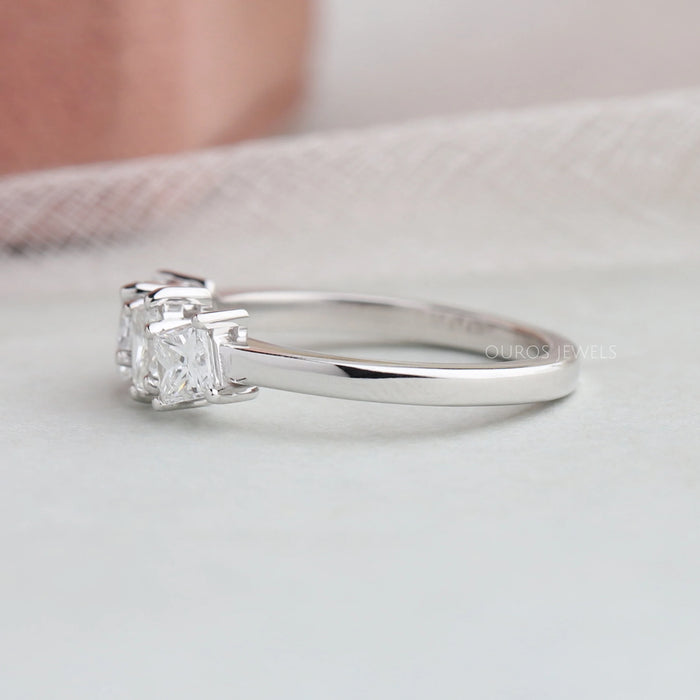 Side look of four stone diamond dainty ring 