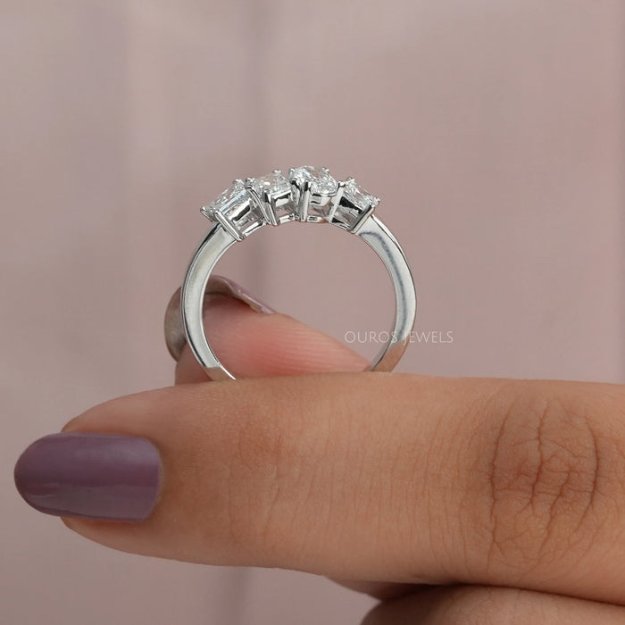 Stone fitting with four prongs setting in 4 stone diamond engagement ring