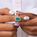 emerald gemstone halo engagement ring 