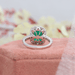 green emerald diaond ring in white gold metal tone