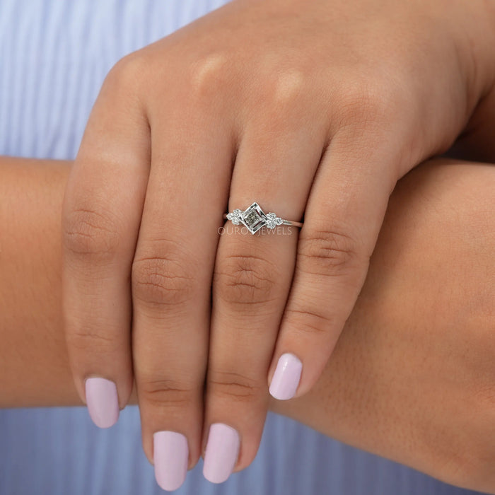 In Finger view of Princess and round cut lab created diamond engagement ring