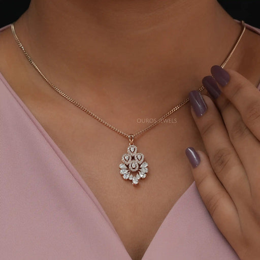 Lovely pear shaped diamond necklace with 14k sold rose gold chain around neck