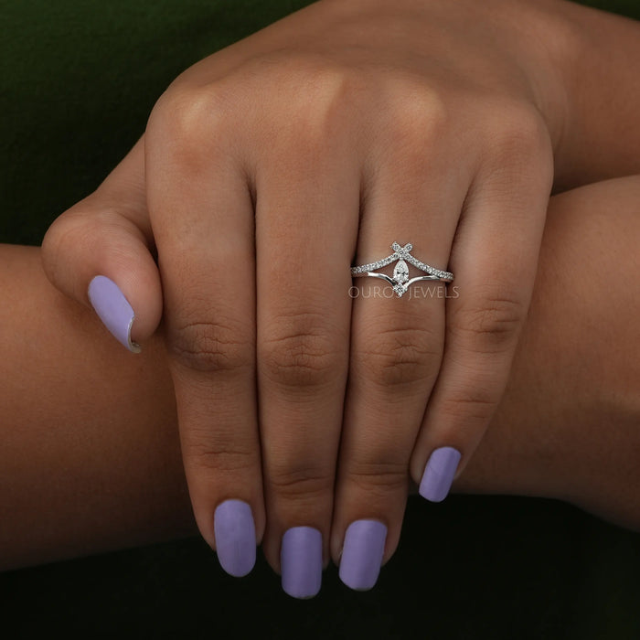 In finger appearance of pear shaped VS clarity lab created diamond engagement ring crafetd in unique style 