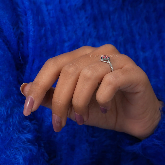 In finger side view of cushion cut solitaire engagement ring, a perfect gift for wedding.