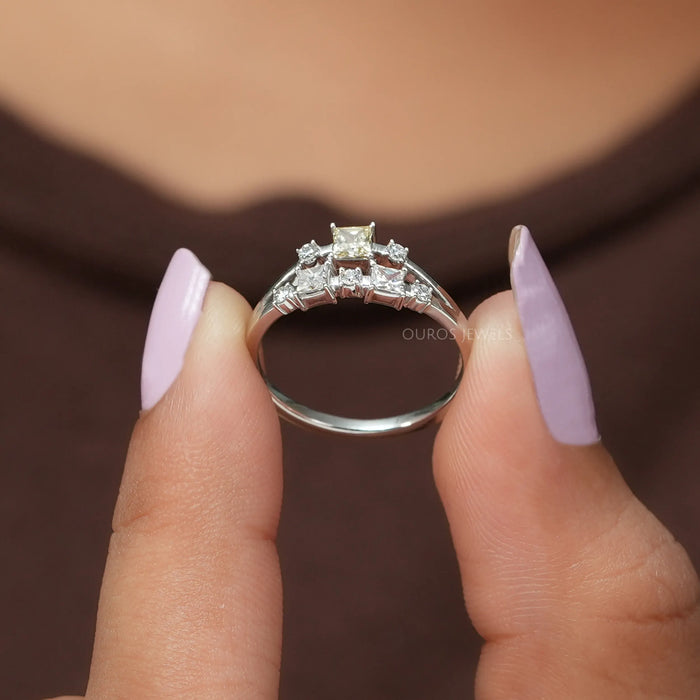 Princess Cut diamond ring with cluster setting in solid gold