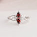 A close look of unique pear shaped lab diamond wedding ring with split shank in solid gold