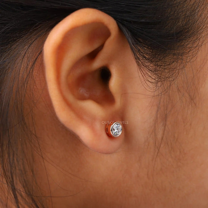 bezel set round diamond studs
