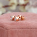 round diamond studs in yellow gold 