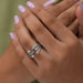in finger front look of vintage pear cut lab made diamond engagement ring