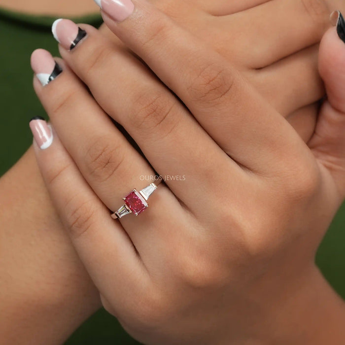 in finger look of 3 stone pink radiant cut lab created diamond engagement ring