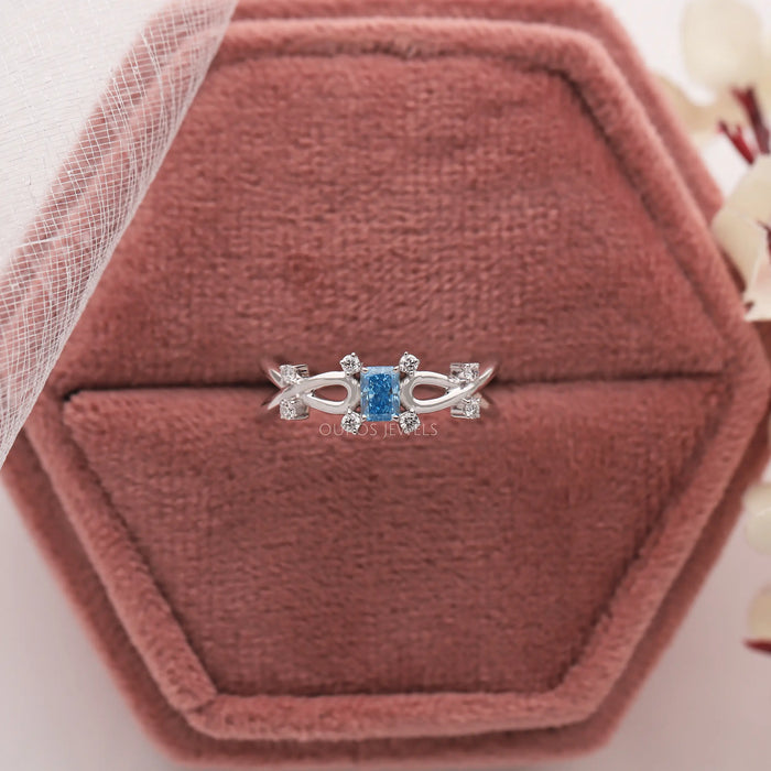 Fancy color diamond ring with infinity design in 14k white gold